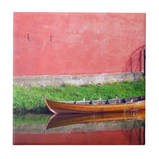 Boat-near-red-round-building BOAT CANOE WATER TRAN Small Square Tile