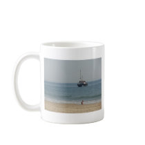 Boat off Bournemouh beach Coffee Mug