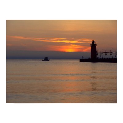 Boat on Lake Michigan at South Haven Lighthouse Poster by hekitchen