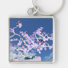 Bonsai inverted purple white against sky portulaca key chains
