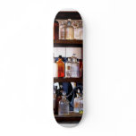 Bottles of Chemicals on Shelves Skate Board