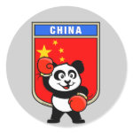 This cute little panda bear is ready for a boxing match! Panda wears boxing gloves before a China flag shield. Great for Chinese boxing fans or boxers!