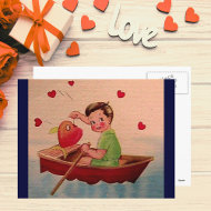 Boy Holding Heart in Boat postcard