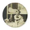 Boy holding teddy bear magnets