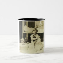 Boy holding teddy bear mugs