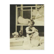 Boy holding teddy bear postcards