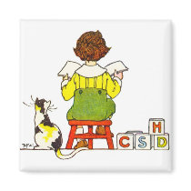 Boy reading magnets