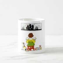 Boy reading mug