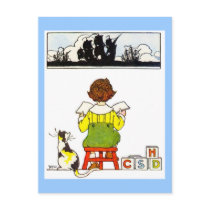 Boy reading postcards
