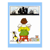 Boy reading postcards