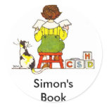 Boy reading round sticker