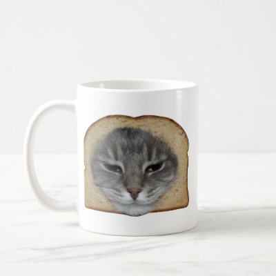 Cat In Mug