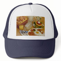 Breakfast of bacon, eggs and pitcher of milk mesh hats