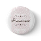round_button - This beautiful Bridesmaid button design features an ornate patterned background in pink with chocolate brown text. It's simply elegant. Customize with your personal information. Ready to dress up your save the date mailings! Additional colors and other coordinating items available in the design. Please visit Two Hearts Wedding Shoppe for a lovely selection of Wedding Postage, Save The Date announcements, Wedding Party Buttons, Bridal Party T-Shirts and other wonderful keepsakes.