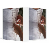 Bridesmaid hand lacing wedding dress photograph binders