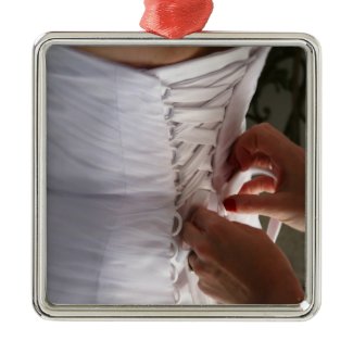 Bridesmaid hand lacing wedding dress photograph ornament