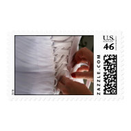 Bridesmaid hand lacing wedding dress photograph stamp