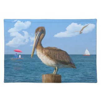 Pelican perched at the ocean