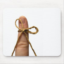 brown string reminder mousepad