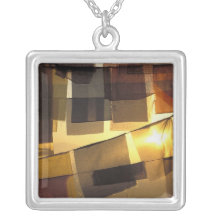 Buddhist prayer flags in the sunset, pendants