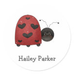 round_sticker - Buggin' You too - country critters for the garden lover. A whimsical and smiling red ladybug with heart-shaped black dots. Created using artwork by Country Life Graphics.: Sizes  Available colors: 0
