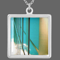 Building and Sky necklaces