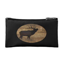 Bull elk bugling in silhouette cosmetics bags