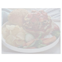 Burger , chips and vegetables in tray personalized letterhead