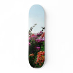 Bush With Purple Red And Orange Flowers Skateboard Deck