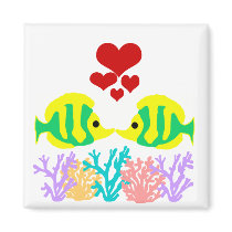 Butterfly Fish kissing over the coral magnet
