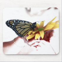 Butterfly in hand mousepads