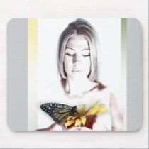 Butterfly in hand mousepads