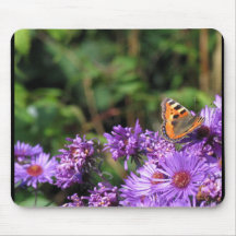 Butterfly on purple flowers mousepad