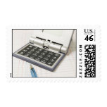 Calculator and Ledger (4) postage