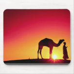 Camel and driver at sunset, India mousepads
