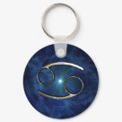 round_keychain - Cancer symbol of Western Astrology with starry background.