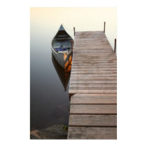 canoe on crystal clear lake posters