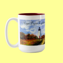 Cape Pogue Lighthouse Mug (Painting & Text) by donnabellas Cape Pogue Lighthouse Mug (Painting & Text)