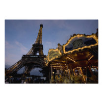 Carousel by the Eiffel Tower in the evening,