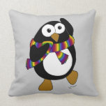Cartoon penguin wearing a colorful rainbow scarf. pillow