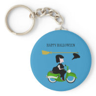 Cartoon Witch Riding A Green Moped Key Chains