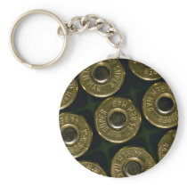Cartridges, .44 magnums in carrier, detail of cap keychain