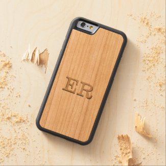 an iPhone 6 case with your monogram on a wood inlay of cherry with a carved or embossed effect