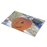Carved pumpkin on grave stone place mat