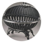 Cast iron fire basket, oval design round stickers
