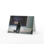 Cat looking at fireplace