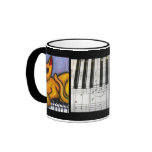 Cat on Piano Keyboard mugs