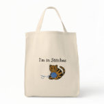 Cat with Ball of Yarn and Saying Bags