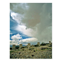 Cement Pilings Under Desert Rainclouds Postcard