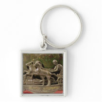 Charioteer in his chariot, detail from a cist keychain